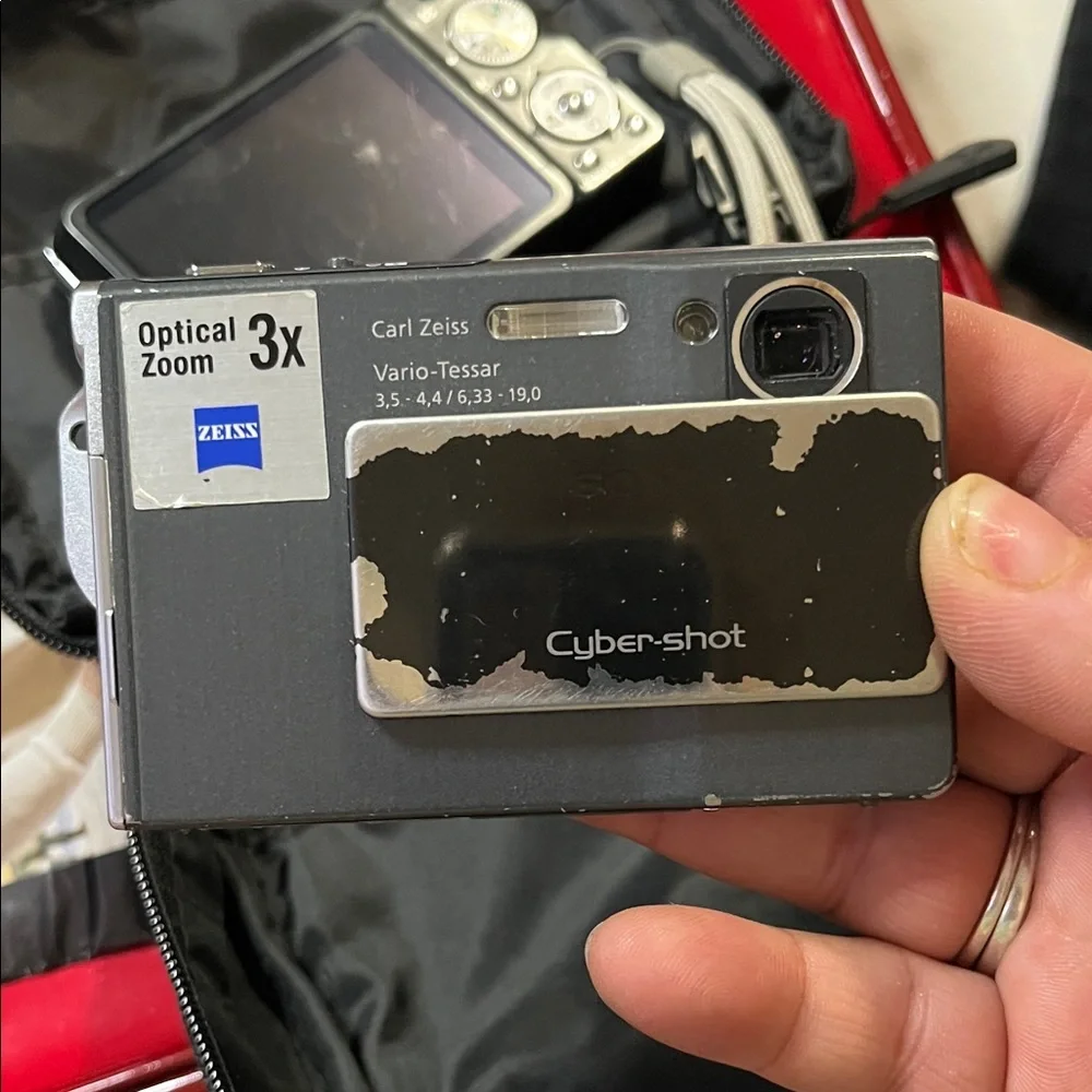 Sony Black and Silver Compact Digital Camera with Case and Accessories